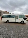 Toyota Coaster 2013 - White - 4