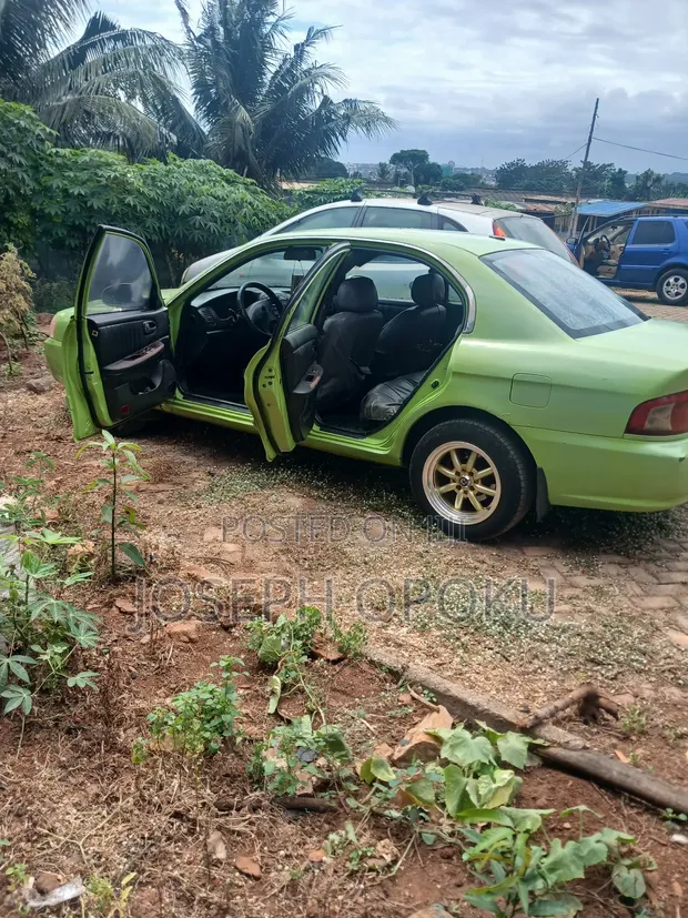 Kia Rondo 2004 Green - 1