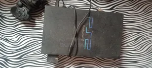 PlayStation 2 Console with 2 Controllers