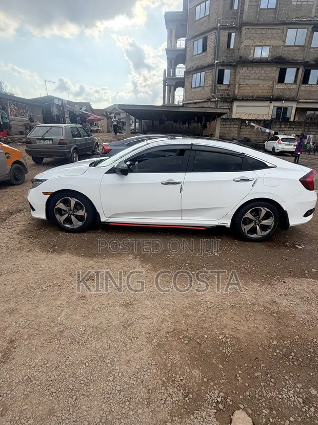 2017 Honda Civic Touring Sedan (1.5L Turbo) - 1