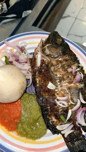 Banku with Tilapia and Hot Pepper