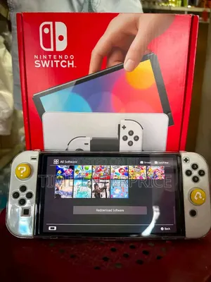 Nintendo Switch OLED Model with Games
