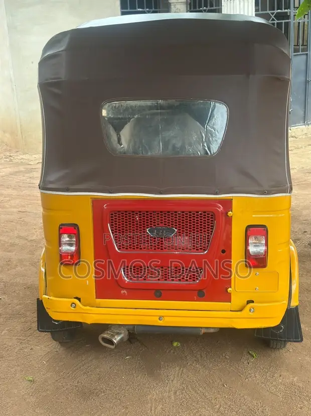 Bajaj RE 2026 Yellow - 1