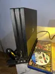 PS4 Pro 1TB Console with 2 Controllers & Games - 1