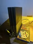 PS4 Pro 1TB Console with 2 Controllers & Games - 2