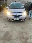 Toyota Vitz 2010 Burgundy - 1