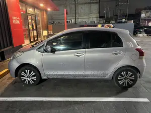 Toyota Vitz Car Rental with Driver