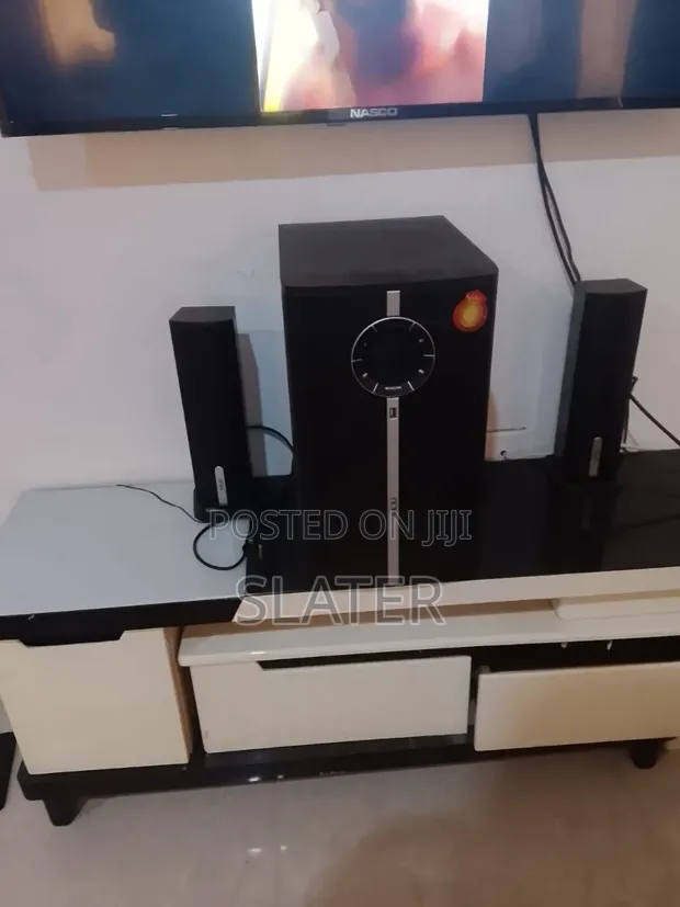 Neatly Used Adjustable TV Stand - 1