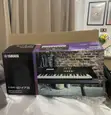 Yamaha PSR-E473 61-Key Portable Keyboard - 1