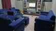 Royal Comfort 7-Seater Blue Velvet Sofa with Cup Holder & Glass Table - 1