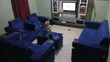 Royal Comfort 7-Seater Blue Velvet Sofa with Cup Holder & Glass Table - 2