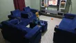 Royal Comfort 7-Seater Blue Velvet Sofa with Cup Holder & Glass Table - 3