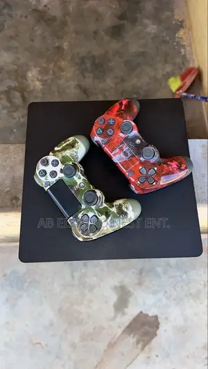 Neat PS4 Slim with 2 Controllers and Games