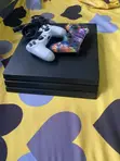 PS4 Pro 1TB with 2 Controllers and 8 Games - 1
