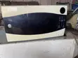 GE 1.3 Cu. Ft. Countertop Microwave Oven - 3