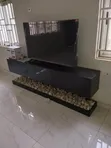 TCL 50-inch Smart TV with Modern Stand - 1