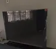 TCL 50-inch Smart TV with Modern Stand - 2