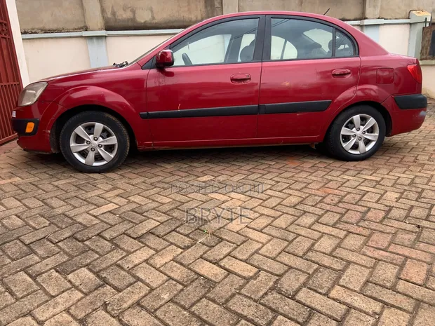 Kia Rio LX 2010 Red Sedan - 1