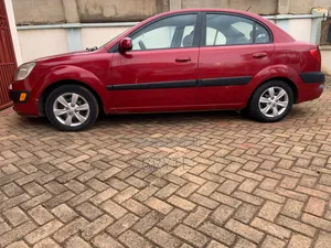 Kia Rio LX 2010 Red Sedan