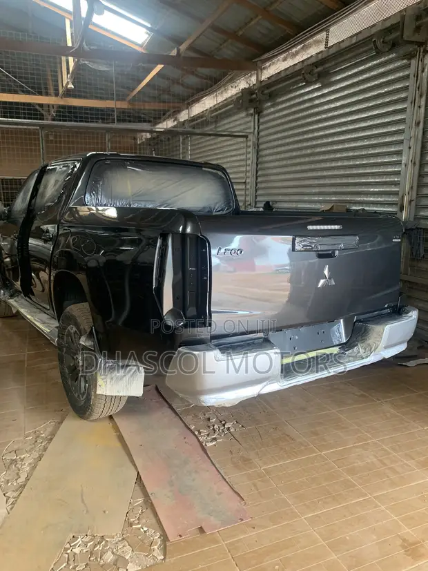 DHASCOL MOTORS: Car Body Works & Maintenance - 1