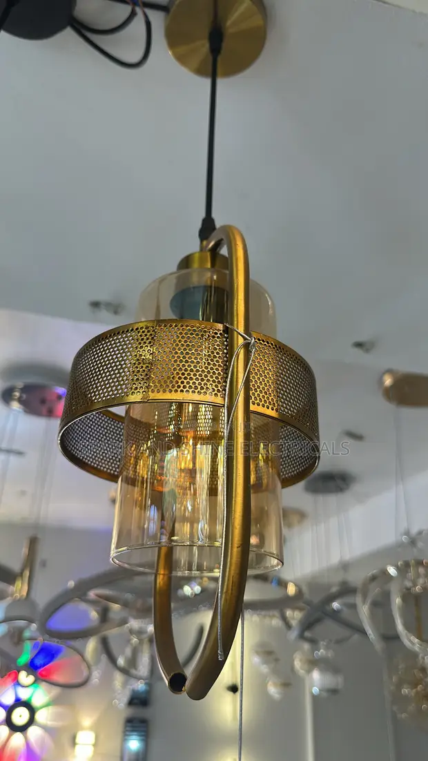 Gold-Finished Pendant Light with Amber Glass Cylinder - 1