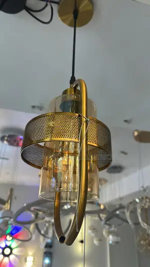 Gold-Finished Pendant Light with Amber Glass Cylinder