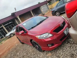 2010 Toyota Corolla LE Sedan - Red