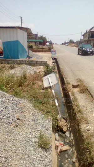 Registered 4 Plots of Land on Main Road, Amasaman Cocobord