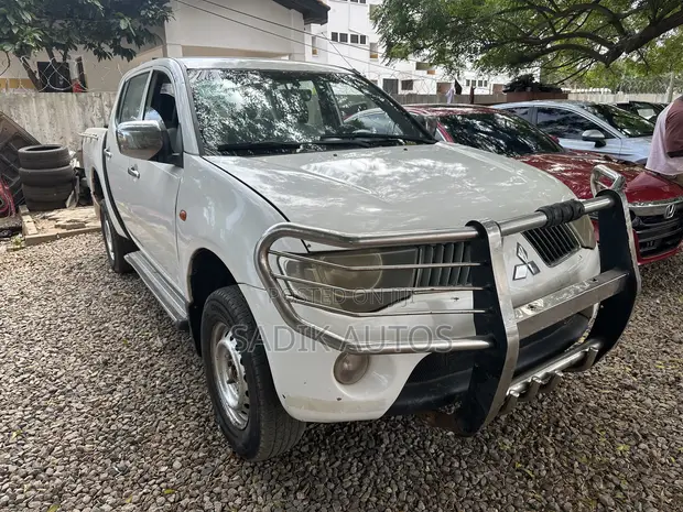 Mitsubishi L200 Double Cab 2.5 136hp 4WD 2009 White - 1