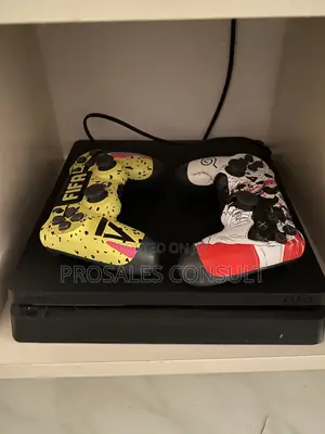 PS4 Slim Console with 2 Controllers
