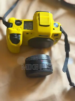 Canon EOS R Mirrorless Camera with Adapter & Accessories