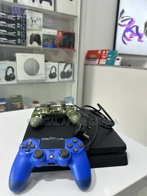 PlayStation 4 Slim with 8 Games & 2 Controllers