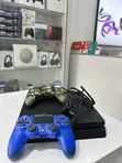 PlayStation 4 Slim with 8 Games & 2 Controllers - 1