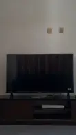 Brand New 50-inch Smart TV and Wooden Stand - 2