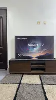 Brand New 50-inch Smart TV and Wooden Stand - 4