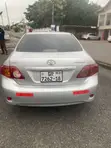 2010 Toyota Corolla LE Sedan - 1