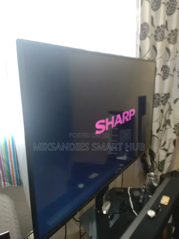 Sharp 55" 4K Smart Satellite TV - 1