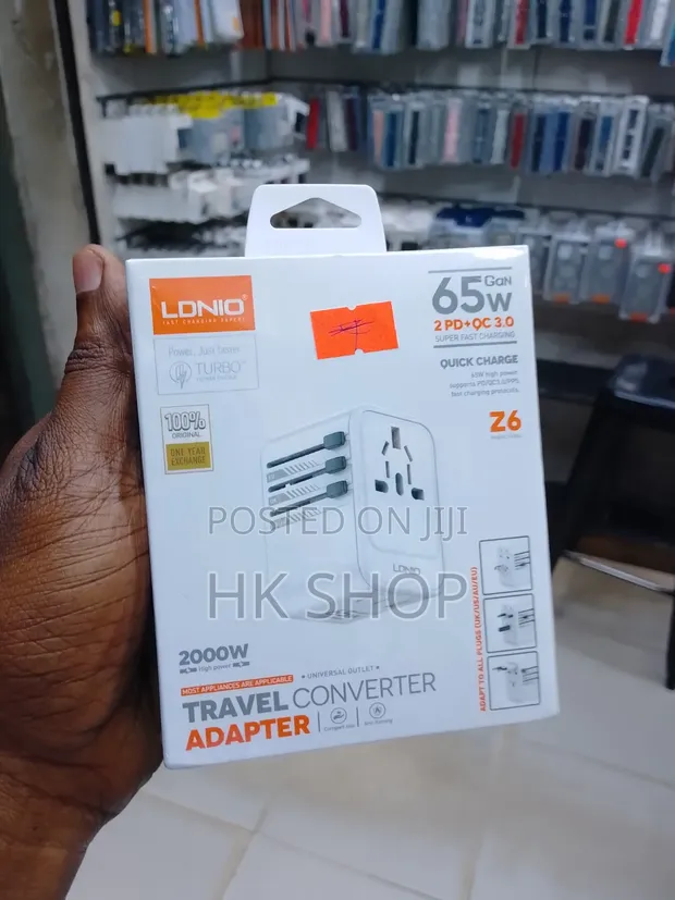 Brand New Travel Adapter with Multiple Sockets - 1