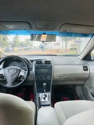 2010 Toyota Corolla LE Sedan - Gold