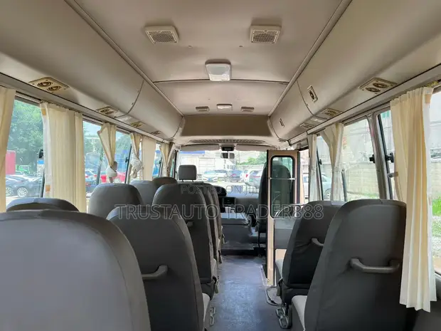 Toyota Coaster 2014 Beige - 1