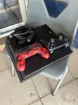 Sony PlayStation 4 with Games & 2 Controllers - 1