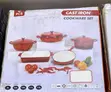 9-Piece Orange Enameled Cast Iron Cookware Set - 1