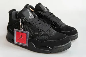 Air Jordan 4 Retro Triple Black Sneakers