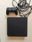 PlayStation 4 with 2 Controllers and 4 Games - 1
