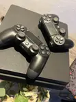 PlayStation 4 Slim with 2 Controllers & Games - 4
