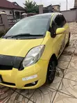 Toyota Vitz 1.3 FWD 5dr Hatchback 2010 Yellow - 4