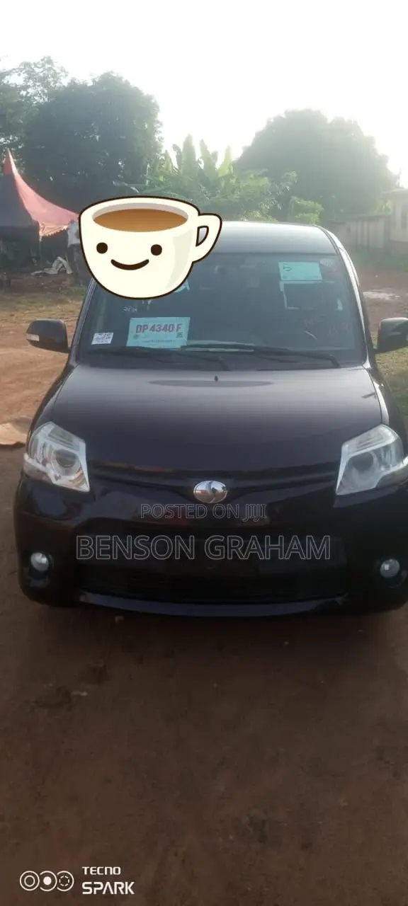 Toyota Sienta 1.5 AWD Minivan 2014 Maroon - 1