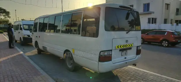 Toyota Coaster 2012 White - 1