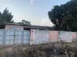110x100 Land with Old Structure in Adenta Housing - 1
