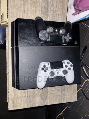 PS4 Standard Console with 6 Games & 2 Controllers